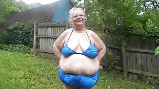in blue bathing suit